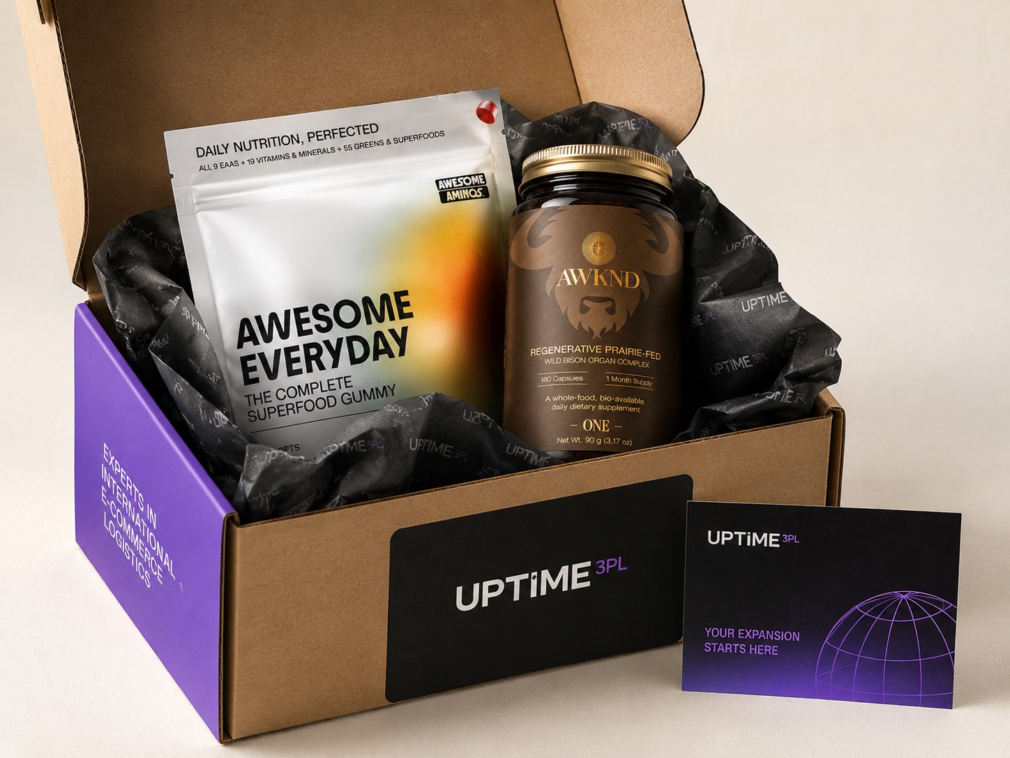 High resolution pick and pack photo with Awesome Aminos and AWKND inside an Uptime 3PL shipping box