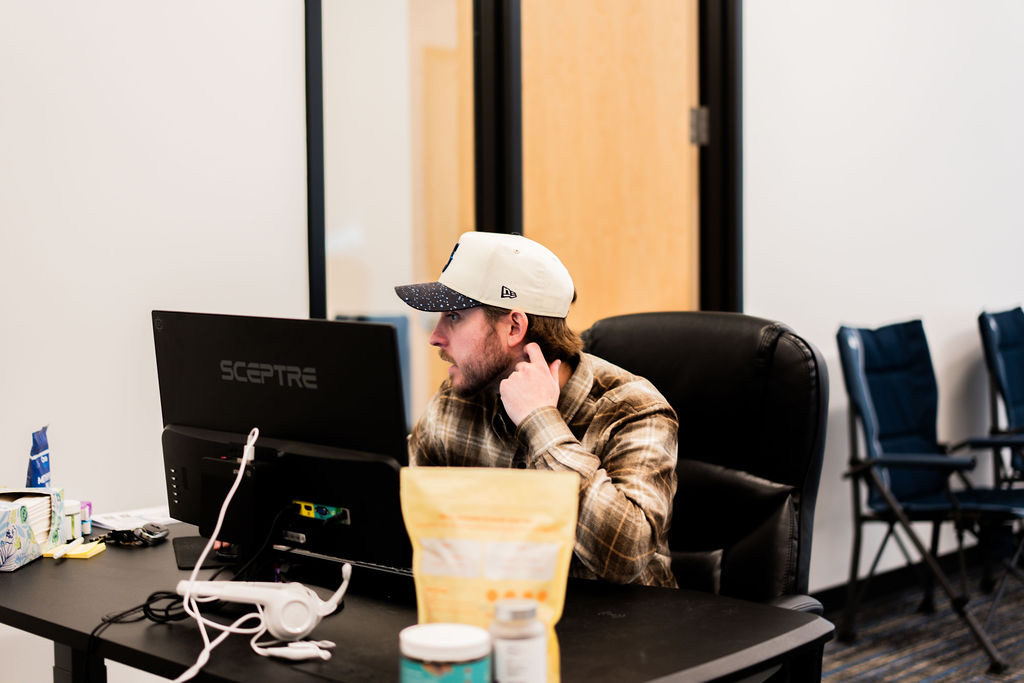 Uptime operations team member managing orders at the fulfillment center desk